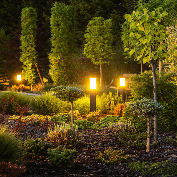 Uneven landscape lighting causing glare and dark patches
