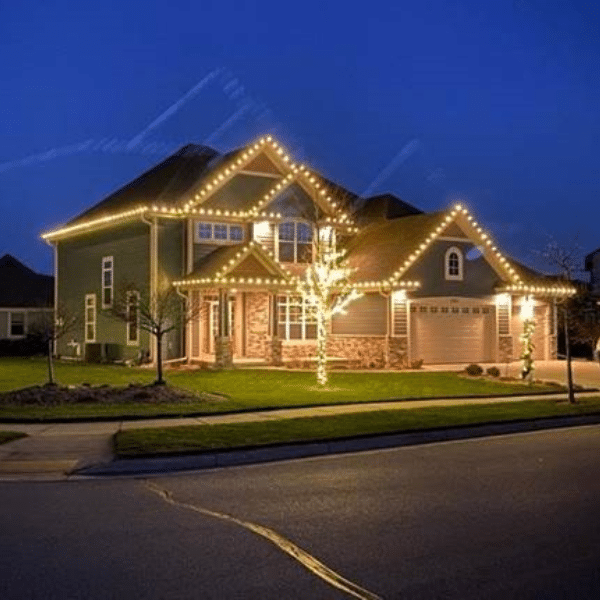 Professional outdoor lighting demo setup at residential home